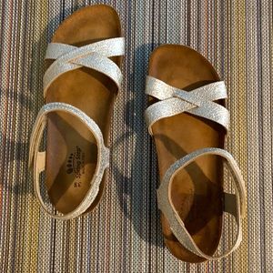Spring Step Sandal. Never worn. Gold glitter straps, cork 1 3/4” heel.